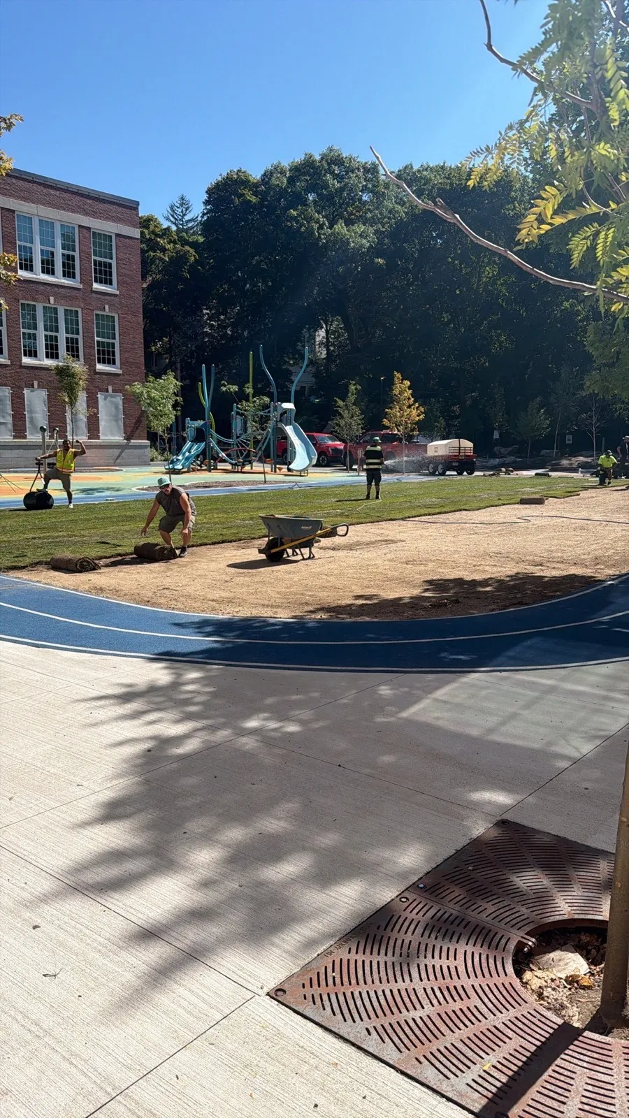 Sod being installed on an athletic field in Boston, MA