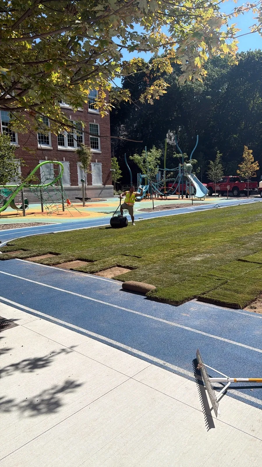Crew carrying out a commercial sod installation in Boston, MA
