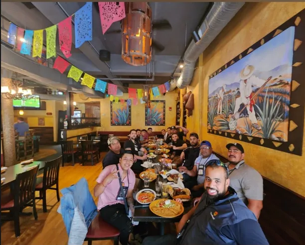The Casablanca Services landscaping crew, who serve Framingham and Greater Boston, MA, together at a team meal